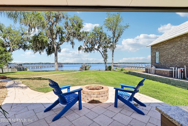 1833 N Lakeshore Dr, Fleming Island, FL 32003 - view of patio / terrace featuring a water view and a fire pit