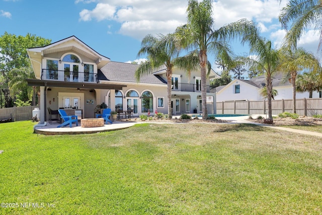 1833 N Lakeshore Dr, Fleming Island, FL 32003 - rear view of property with french doors, a patio, a fire pit, and a balcony