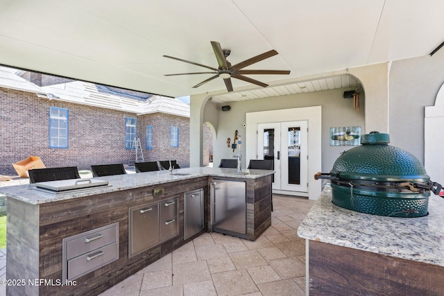 1833 N Lakeshore Dr, Fleming Island, FL 32003 - view of patio / terrace featuring ceiling fan, a sink, french doors, and area for grilling