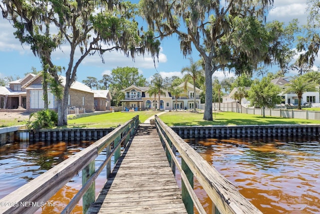 1833 N Lakeshore Dr, Fleming Island, FL 32003 - dock area with a lawn, fence, a water view, and a residential view