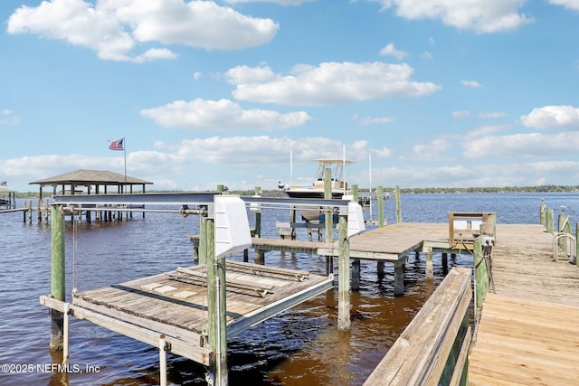1833 N Lakeshore Dr, Fleming Island, FL 32003 - view of dock featuring boat lift and a water view