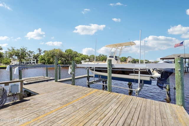 1833 N Lakeshore Dr, Fleming Island, FL 32003 - view of dock with boat lift and a water view