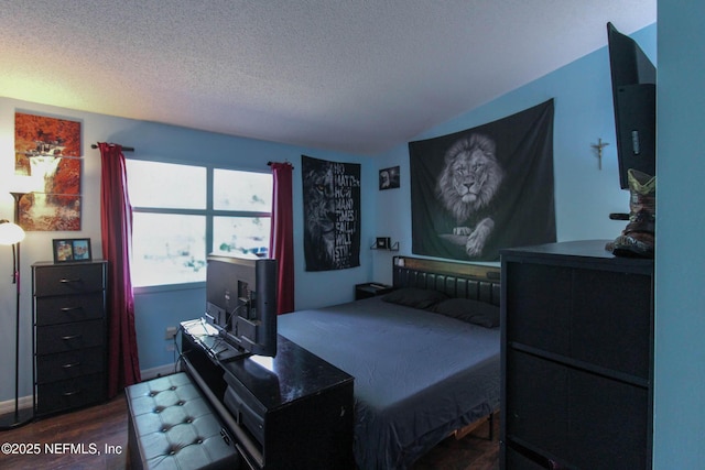 1403 Marsh Cove Ct, Ponte Vedra Beach, FL 32082 - bedroom featuring a textured ceiling, dark wood-type flooring, and baseboards