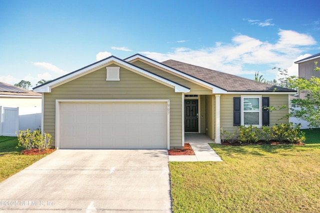 single story home featuring concrete driveway, a front yard, and a garage