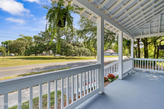 1230 Beech St, Fernandina Beach, FL 32034 - balcony featuring covered porch