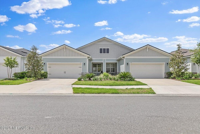 view of front of house featuring driveway and a garage