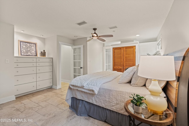 bedroom with baseboards and recessed lighting