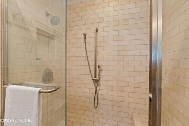 full bathroom featuring a stall shower