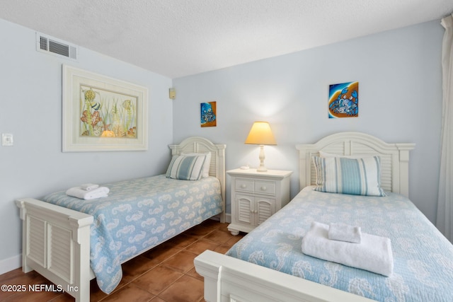 1029 Captains Court Dr Unit 1029, Fernandina Beach, FL 32034 - tiled bedroom with a textured ceiling