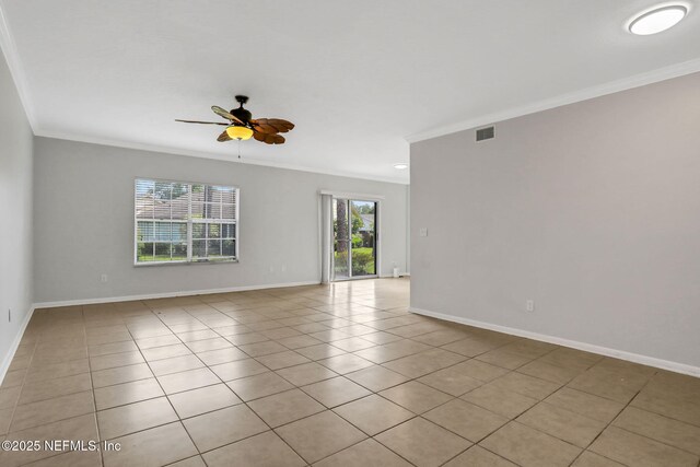 unfurnished room featuring a ceiling fan, ornamental molding, and visible vents