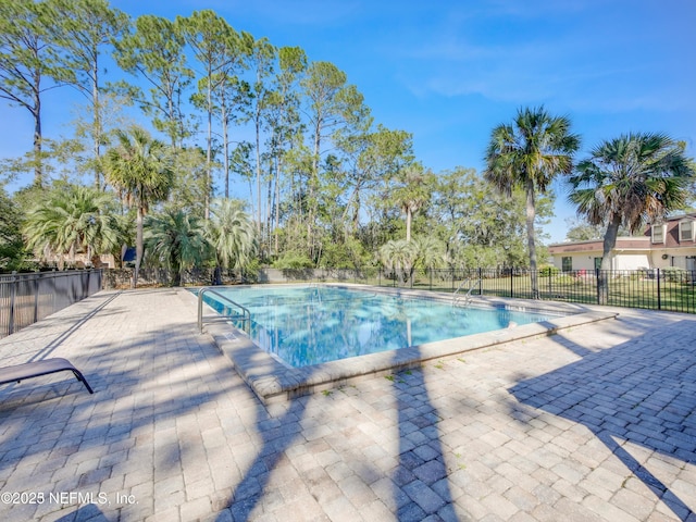 9252 San Jose Blvd Unit 2002, Jacksonville, FL 32257 - view of pool featuring fence and a patio