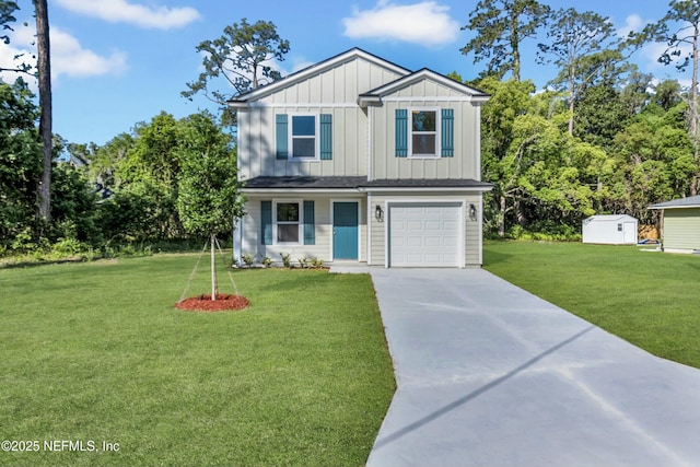 view of front of house featuring driveway, a garage, board and batten siding, and a front yard