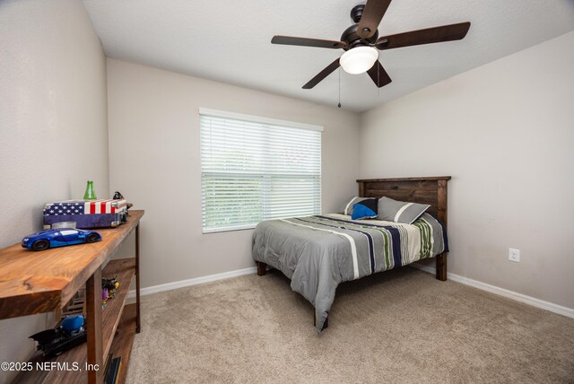 19533 NW 229th St, High Springs, FL 32643 - bedroom with light colored carpet and ceiling fan
