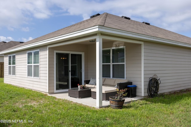 19533 NW 229th St, High Springs, FL 32643 - back of property with a patio area, a lawn, and an outdoor hangout area
