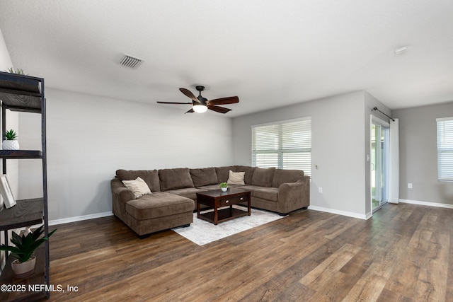 19533 NW 229th St, High Springs, FL 32643 - living room with dark wood finished floors and ceiling fan