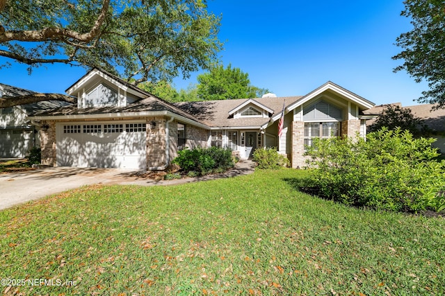single story home with concrete driveway, an attached garage, brick siding, and a front lawn