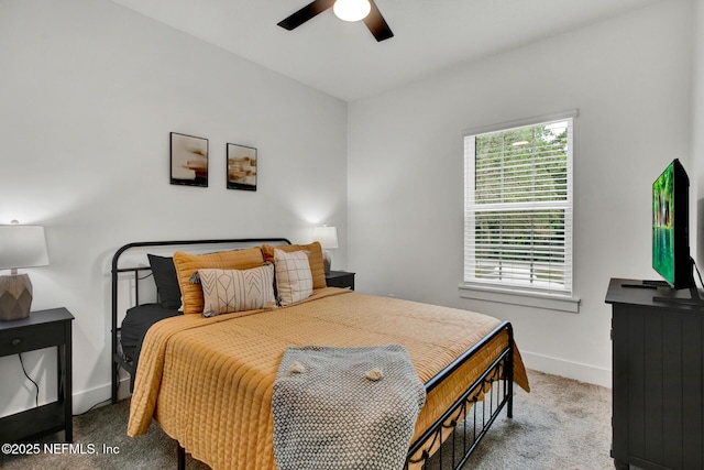 bedroom featuring a ceiling fan, baseboards, and carpet floors