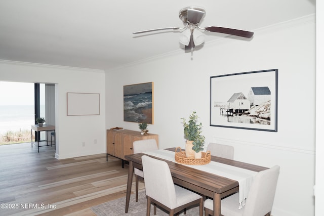 661 Ponte Vedra Blvd Unit 661B, Ponte Vedra Beach, FL 32082 - dining room with light wood-style floors, crown molding, a ceiling fan, and baseboards