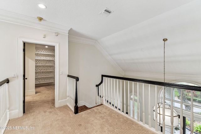 6230 Highlands Ct, Ponte Vedra Beach, FL 32082 - hallway with light carpet, an upstairs landing, crown molding, baseboards, and lofted ceiling