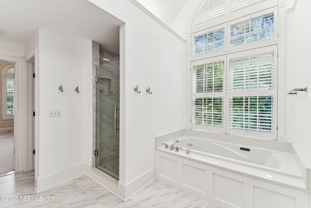 6230 Highlands Ct, Ponte Vedra Beach, FL 32082 - bathroom featuring a garden tub, healthy amount of natural light, a stall shower, and marble look tile flooring