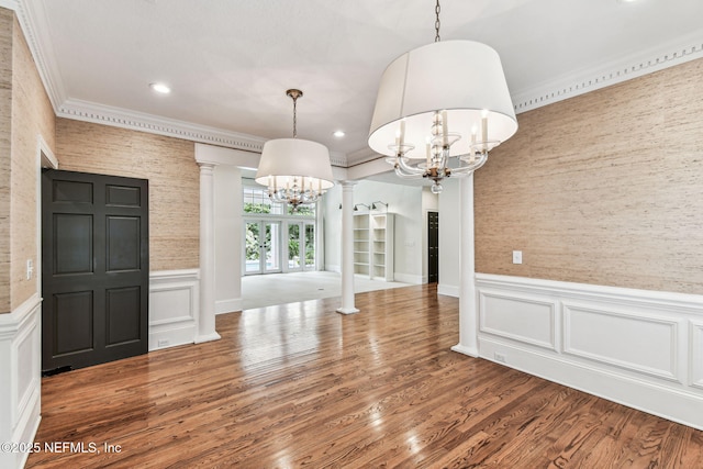 6230 Highlands Ct, Ponte Vedra Beach, FL 32082 - unfurnished dining area with a chandelier, decorative columns, wainscoting, crown molding, and recessed lighting