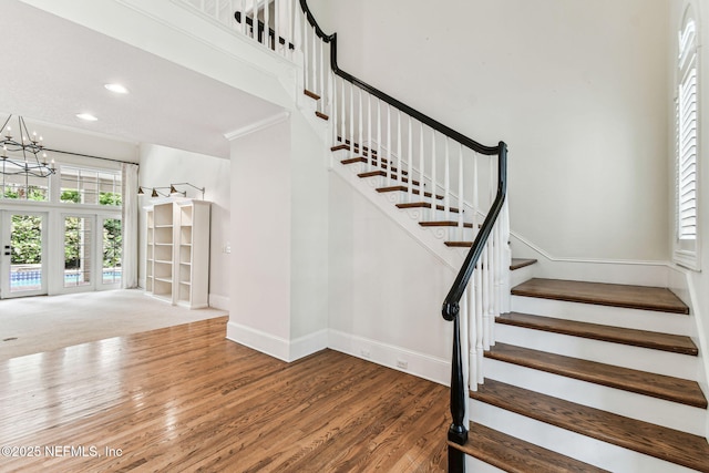 6230 Highlands Ct, Ponte Vedra Beach, FL 32082 - stairway featuring baseboards, a chandelier, wood finished floors, and recessed lighting