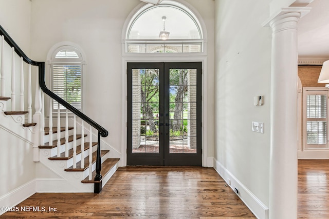 6230 Highlands Ct, Ponte Vedra Beach, FL 32082 - entryway featuring french doors, stairway, wood finished floors, and baseboards