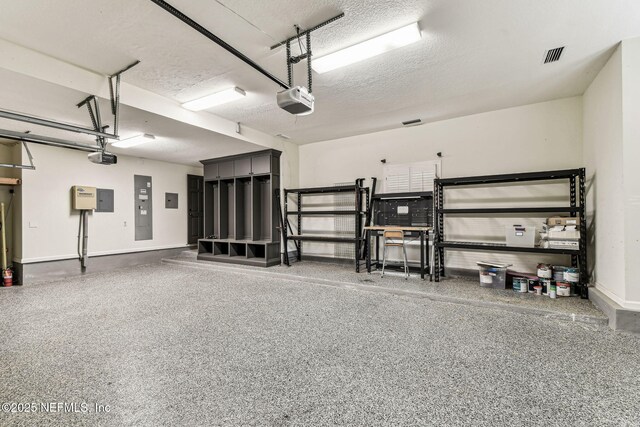 6230 Highlands Ct, Ponte Vedra Beach, FL 32082 - garage with a garage door opener, electric panel, and baseboards