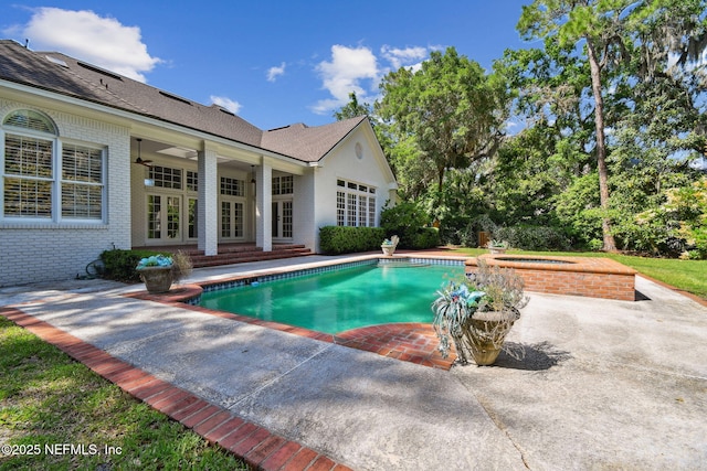 6230 Highlands Ct, Ponte Vedra Beach, FL 32082 - outdoor pool featuring french doors, an in-ground hot tub, and a patio area