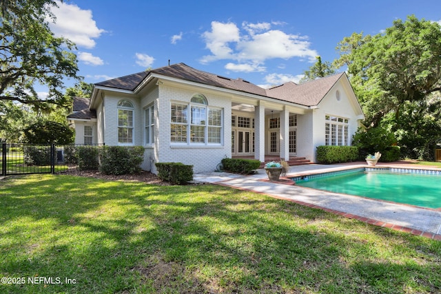 6230 Highlands Ct, Ponte Vedra Beach, FL 32082 - rear view of house featuring brick siding and a patio