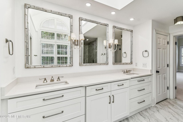 6230 Highlands Ct, Ponte Vedra Beach, FL 32082 - full bath with double vanity, recessed lighting, a skylight, and marble look tile flooring