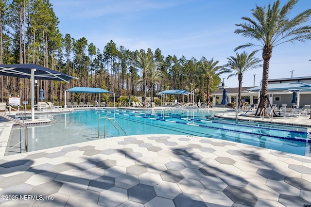 pool with a patio area