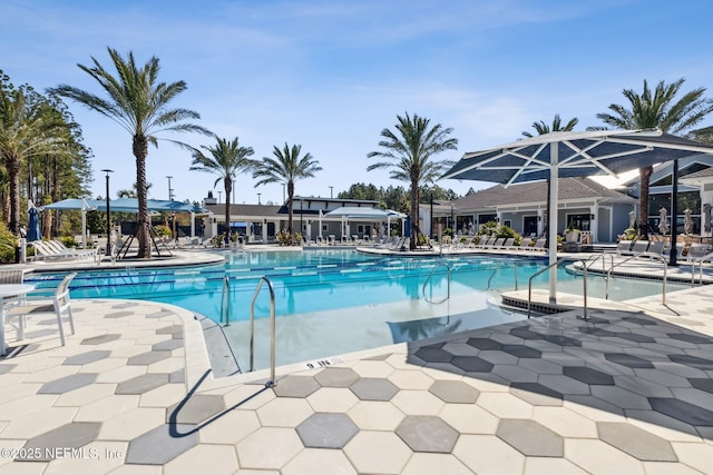 community pool featuring a patio area