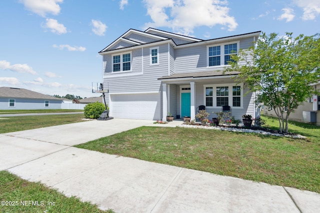 traditional-style home with an attached garage, a front lawn, covered porch, and concrete driveway