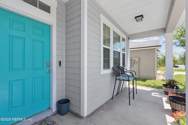 entrance to property with covered porch