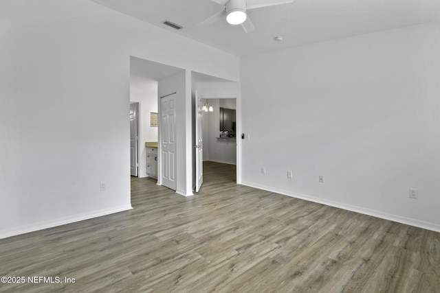 11213 Harbour Vista Cir, Saint Augustine, FL 32080 - spare room with a ceiling fan, baseboards, visible vents, and light wood finished floors