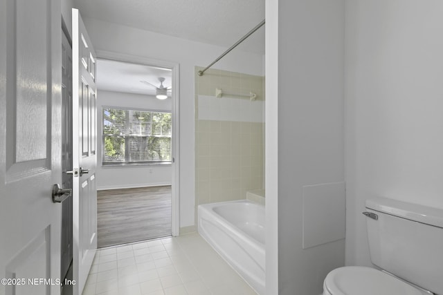 11213 Harbour Vista Cir, Saint Augustine, FL 32080 - bathroom featuring tile patterned flooring, a ceiling fan, shower / bath combination, and toilet