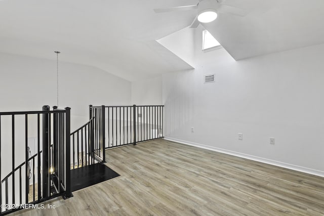 11213 Harbour Vista Cir, Saint Augustine, FL 32080 - bonus room featuring ceiling fan, visible vents, wood finished floors, baseboards, and lofted ceiling