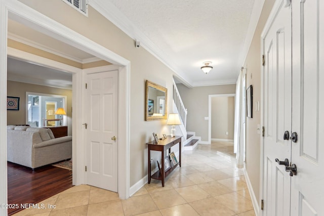 2942 Mandarin Hollow Dr, Jacksonville, FL 32257 - corridor featuring stairway, baseboards, crown molding, and light tile patterned flooring