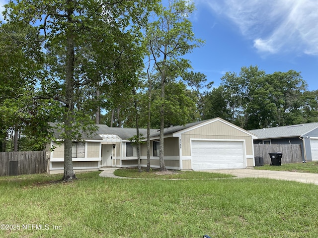 3186 Bee St E, Orange Park, FL 32065 - view of front facade with driveway and a garage