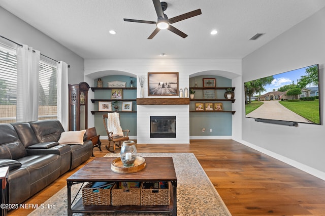 1712 Margarets Walk Rd, Fleming Island, FL 32003 - living room featuring recessed lighting, ceiling fan, wood finished floors, and a fireplace
