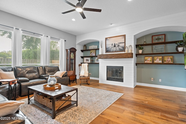 1712 Margarets Walk Rd, Fleming Island, FL 32003 - living room featuring recessed lighting, a ceiling fan, a textured ceiling, and wood finished floors