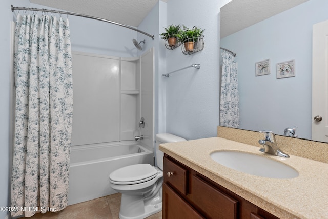 bathroom featuring a textured ceiling, tile patterned flooring, shower / tub combo, vanity, and toilet