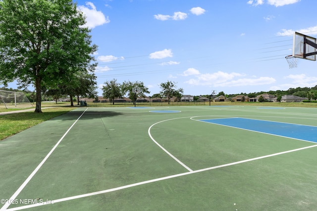 view of sport court featuring community basketball court and fence