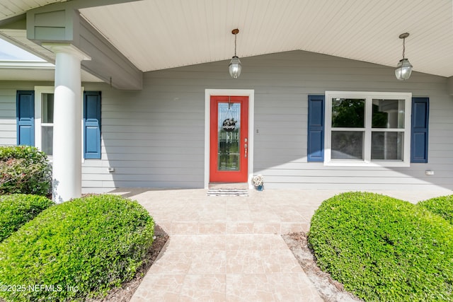 doorway to property with a porch