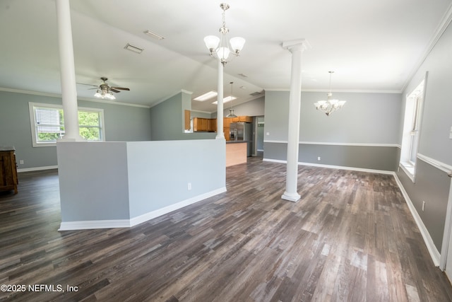unfurnished living room with visible vents, dark wood-type flooring, baseboards, decorative columns, and ceiling fan with notable chandelier