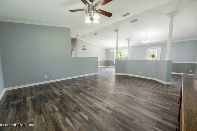spare room featuring baseboards, ceiling fan with notable chandelier, visible vents, and ornate columns