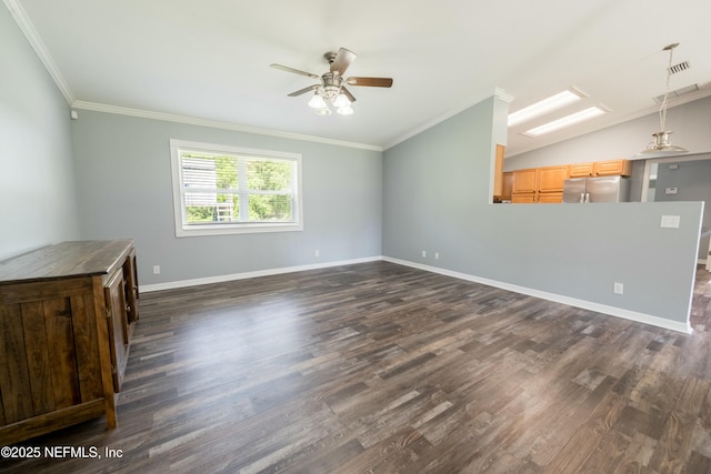 unfurnished living room with dark wood-style floors, visible vents, ornamental molding, baseboards, and ceiling fan