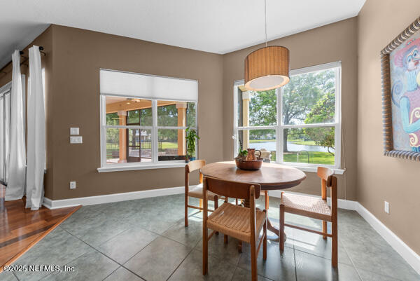 dining room featuring baseboards