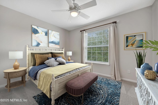 9831 Del Webb Pkwy Unit 1302, Jacksonville, FL 32256 - bedroom with light carpet, baseboards, and a ceiling fan